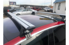 Dakdragers Tesla Model 3 rood schuin detail